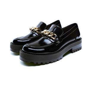 Chain loafer with chunky sole.